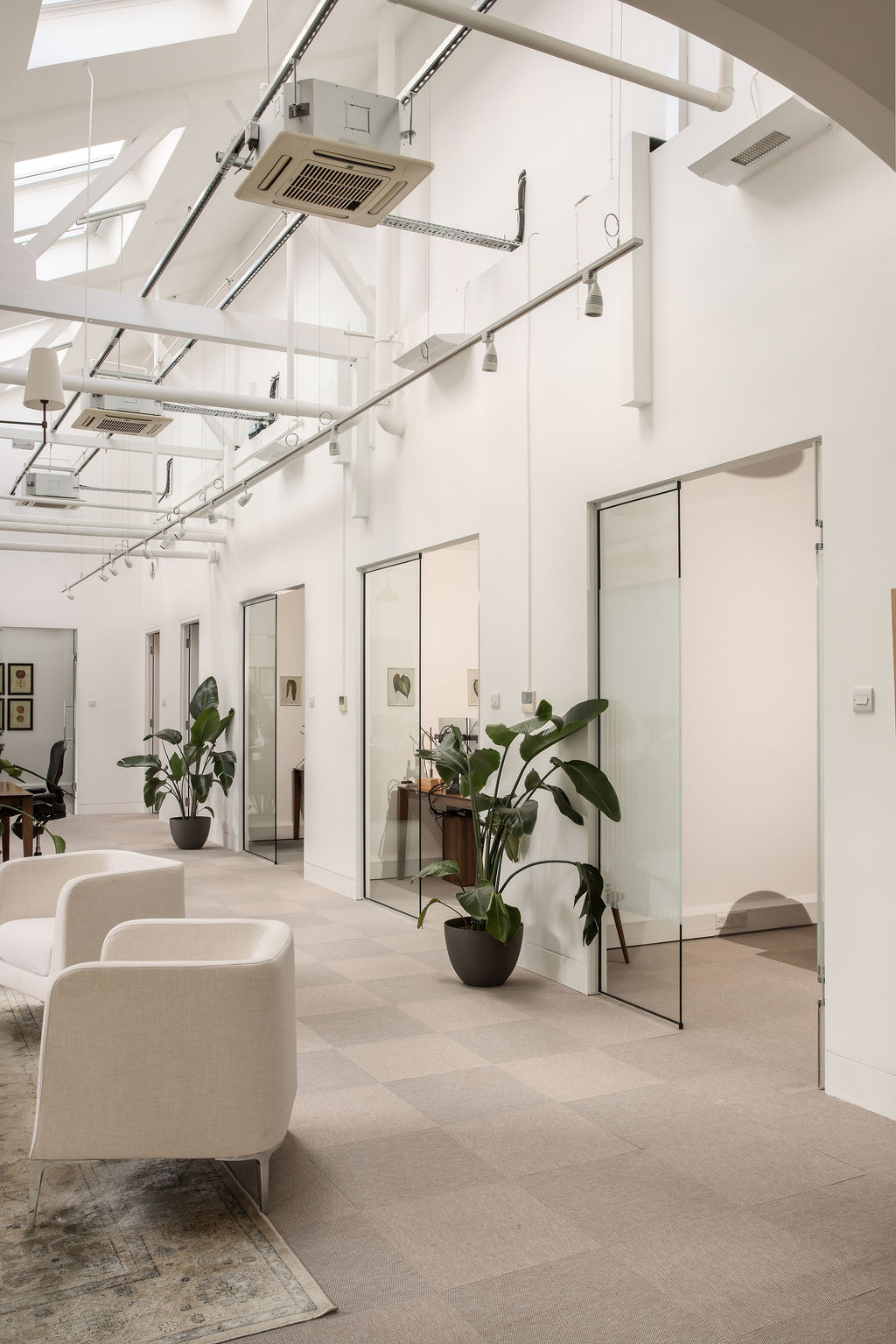 The London Office — Glass-partitioned offices